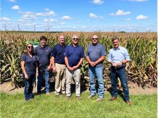 Rodrigo Santos with the Bachman family on their farm in Illinois